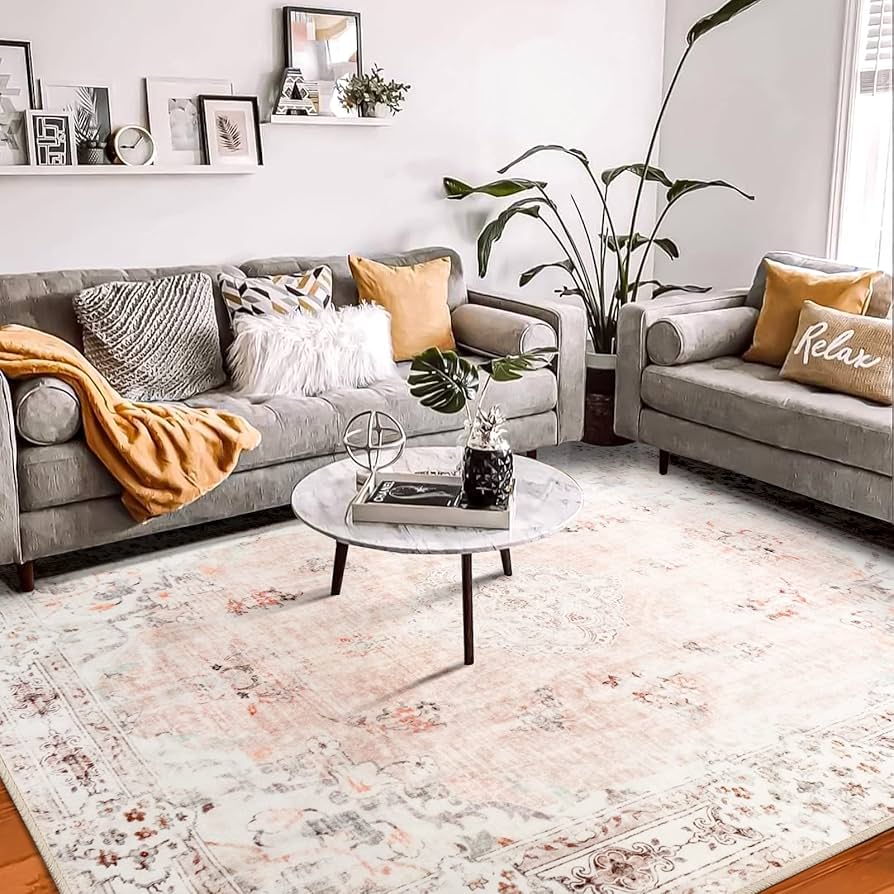 soft blush pink rug and grey sofa