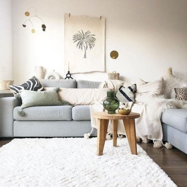 white rug and grey sofa